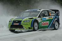 Marcus Gr&ouml;nholm driving the Ford Focus RS WRC 06 in 2006.