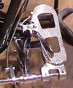 This pedal is on a Dresden timpano. The timpanist must disengage the clutch&nbsp;&ndash; seen here on the left of the pedal&nbsp;&ndash; to change the pitch of the drum.