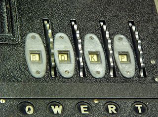 Figure 2. With the inner lid down, the Enigma was ready for use. The finger wheels of the rotors protruded through the lid, allowing the operator to set the rotors, and their current position&mdash;here RDKP&mdash;was visible to the operator through a set of windows.