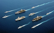 Four modern aircraft carriers of various types &ndash;  USS John C. Stennis, FS Charles de Gaulle, HMS Ocean and USS John F. Kennedy &mdash; and escort vessels on operations in 2002. The ships are sailing much closer together than they would during combat operations.