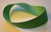 A M&ouml;bius strip, an object with only one surface and one edge; such shapes are an object of study in topology.