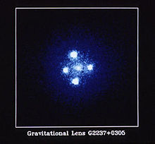 Einstein cross: four images of the same astronomical object, produced by a gravitational lens