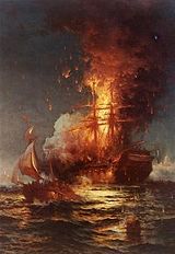 February 16: USS Philadelphia burns.