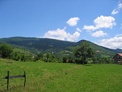 View of Kik Mountain (right), 1,000&nbsp;m (3,280&nbsp;ft); and Rance (Suvi Vrh) Mountain (left), 1,432&nbsp;m (4,698&nbsp;ft).