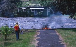 Lava can easily destroy entire towns. This picture shows one of over 100 houses destroyed by the lava flow in Kalapana, Hawaiʻi, United States, in 1990.