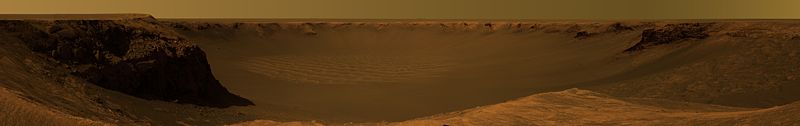 This approximate true-color image, taken by the Mars Exploration Rover Opportunity, shows the view of  Victoria Crater from Cape Verde.  It was captured over a three-week period, from October 16 &ndash; November 6, 2006.