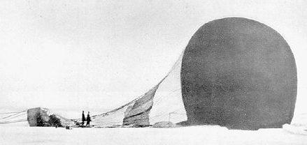 S. A. Andr&eacute;e and Knut Fr&aelig;nkel with the crashed balloon on the pack ice, photographed by the third expedition member, Nils Strindberg. The exposed film for this photograph and others from the failed 1897 expedition was recovered in 1930.
