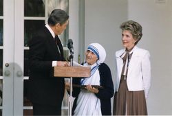 President Ronald Reagan presents Mother Teresa with the Presidential Medal of Freedom at a White House ceremony, 1985