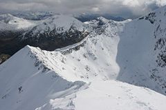The CMD Ar&ecirc;te under deep snow in spring, from the summit of Carn M&ograve;r Dearg.