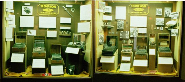 A selection of seven Enigma machines and paraphernalia exhibited at the USA's National Cryptologic Museum. From left to right, the models are: 1) Commercial Enigma; 2) Enigma T; 3) Enigma G; 4) Unidentified; 5) Luftwaffe (Air Force) Enigma; 6) Heer (Army) Enigma; 7) Kriegsmarine (Naval) Enigma&mdash;M4.